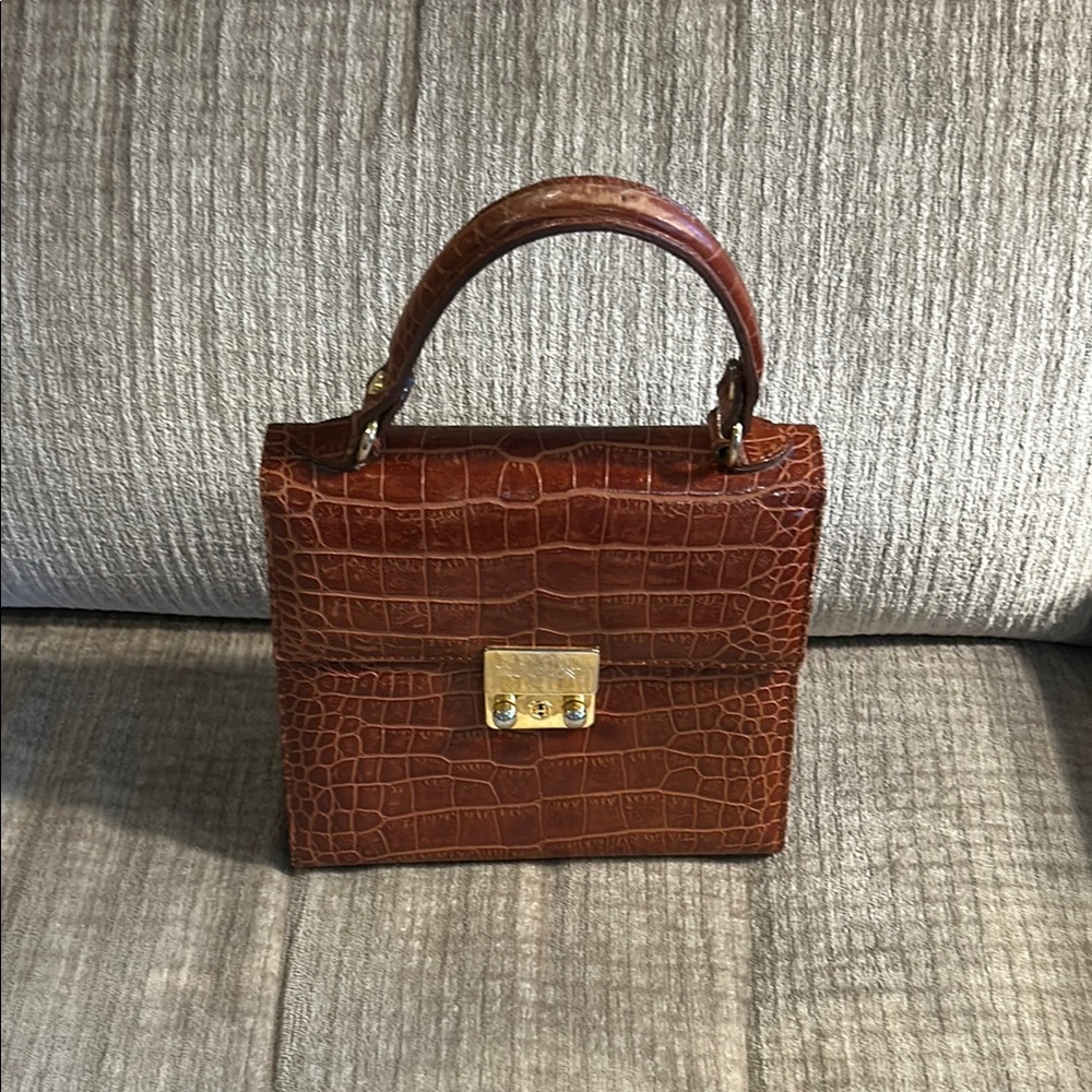 Francesco Rogani crocodile embossed leather and lined with suede leather. 8 x 8.